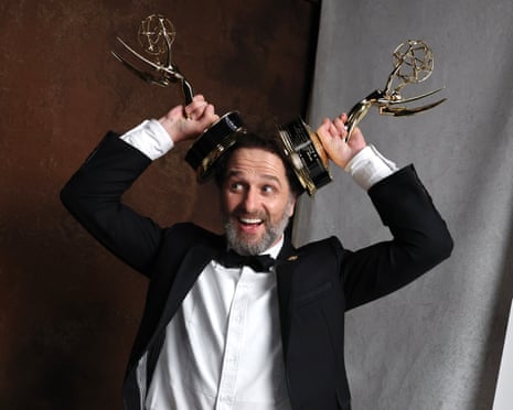 Matthew Rhys with his Emmy awards for best lead comedy actor and best lead actor in a limited series.
