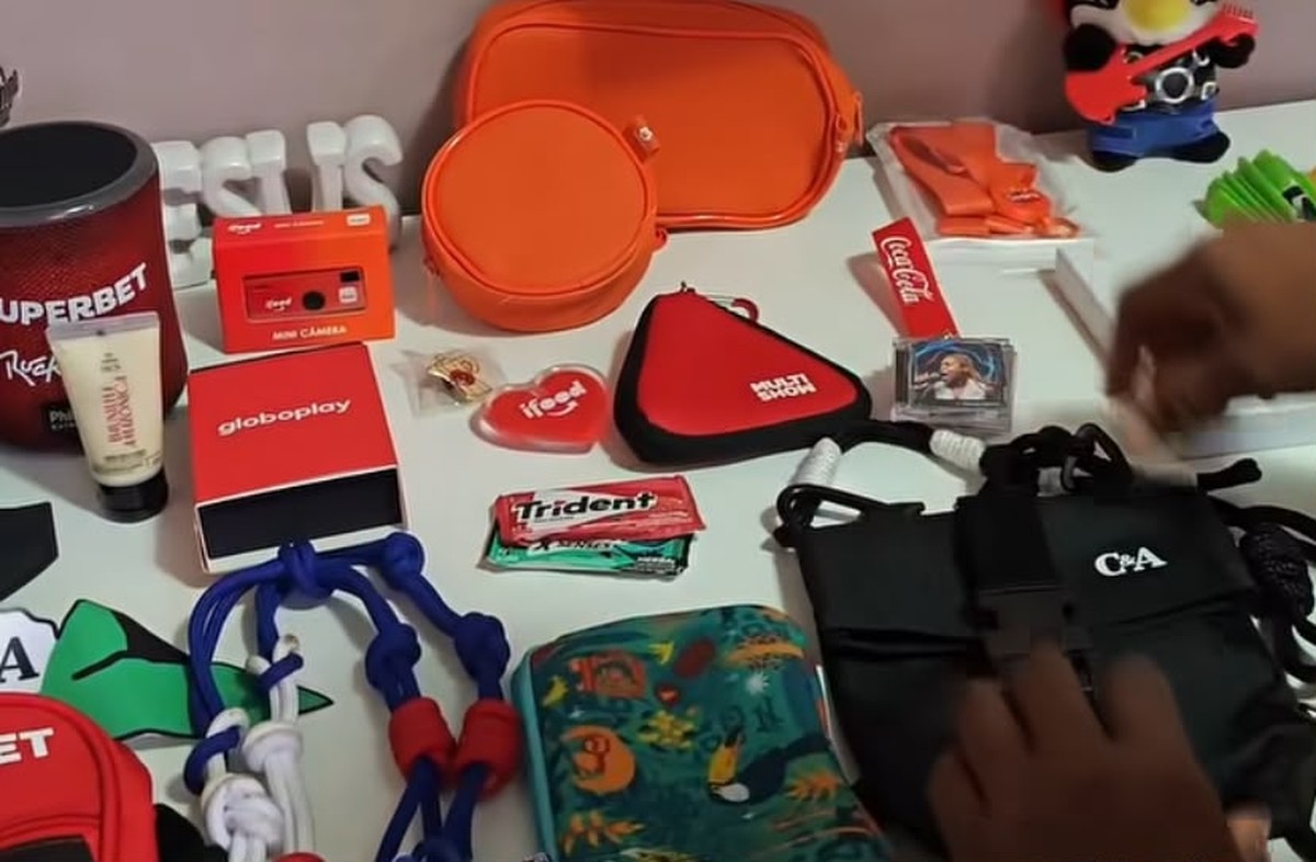Caçadora de brindes do Rock in Rio passou o dia inteiro em busca de itens e juntou mais de 20 mimos