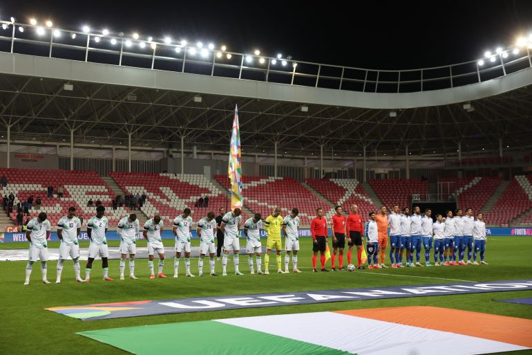 Soccer Football - Nations League - Group B3 - Israel v Republic of Ireland - Nagyerdei Stadion, Debrecen, Hungary - September 27, 2026 Republic of Ireland players bow their heads and wear black armbands in recognition of all lives lost in the Gaza conflict during the national anthems before the match REUTERS/Bernadett Szabo