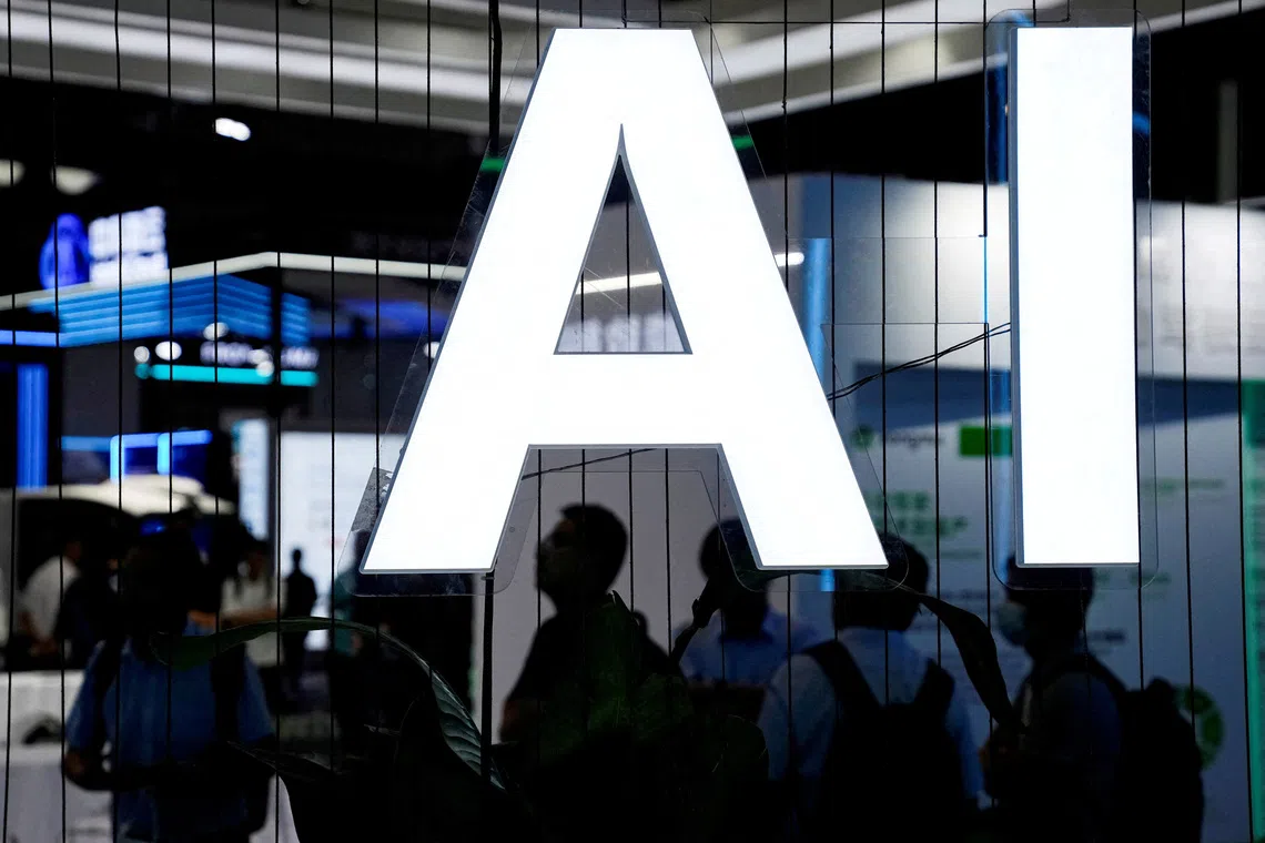 FILE PHOTO: An AI (Artificial Intelligence) sign is seen at the World Artificial Intelligence Conference (WAIC) in Shanghai, China July 6, 2023. REUTERS/Aly Song/File Photo