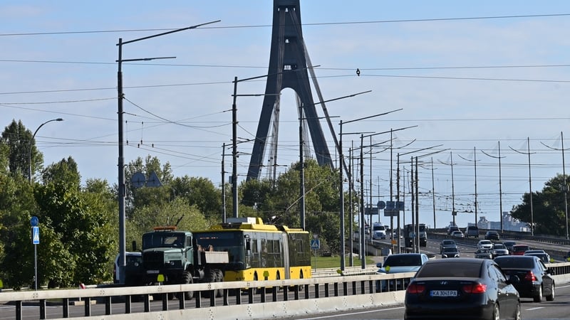 A tractor evacuates a trolleybus after a power line was damaged